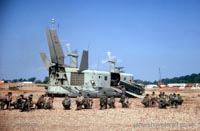 Troops taking up defensive positions around the craft